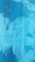 Blue painted wall texture with stains and smudges