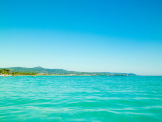 Obraz premium Blue water of Tyrrhenian sea in Vada, Tuscany, Italy.