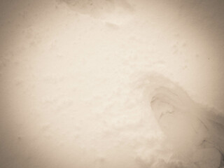 Nature background - shoe footprint in the snow.