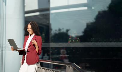 African american business woman with tablet pc in office district.