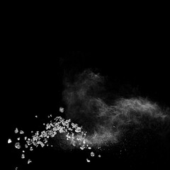 Mixed stone explosion on black background.
