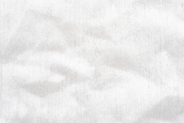 Obraz premium Texture of white porous fabric. Background from napkin texture