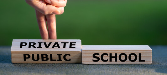 Hand turns dice and changes the expression 'public school' to 'private school'.