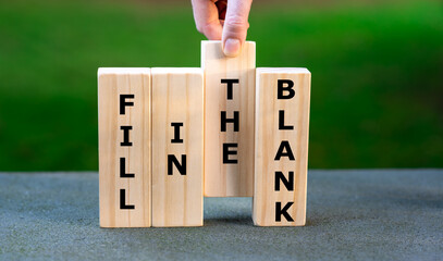 Blocks form the expression 'fill in the blank'.