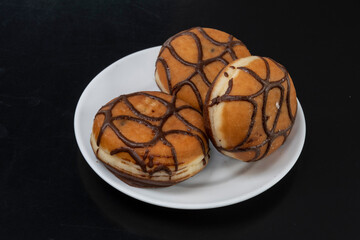 Berlinas rellenas de crema y chocolate