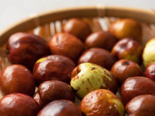 Fresh jujube on a wooden tray
