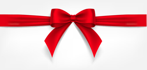 Satin decorative red bow with horizontal red ribbon isolated on white background