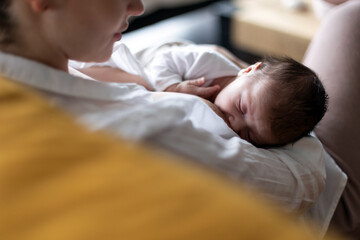 Mom breastfeeding her little baby