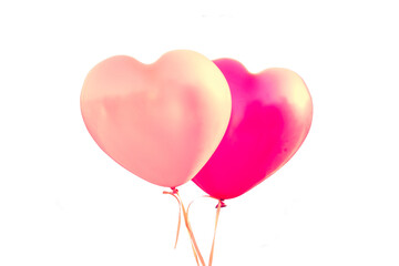 Two pink balloons in the shape of hearts isolated on transparent background, valentine's day or wedding