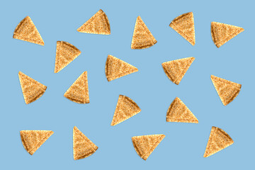 Many crepes (french pancakes) isolated on blue background, Chandeleur or Candlemas pattern