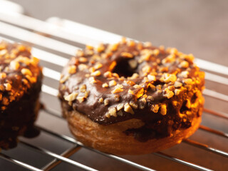 Peanut and cream topping donuts on the oven grill