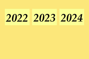Text 2024 . 2023. Postcard Happy New Year 2024. From 2023 to 2024. Merry Christmas and Happy New Year. Yellow background 2024. new year idea concept.