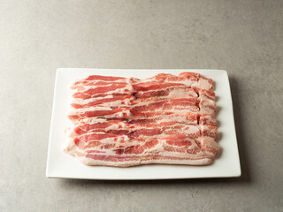 Fresh raw pork belly on a plate