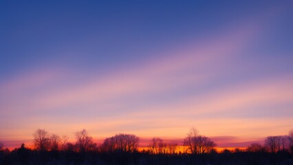 Fototapeta na wymiar Misty romantic winter sunset.