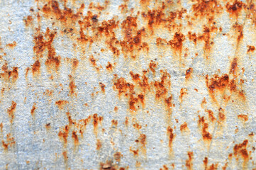 Fototapeta premium The surface of the old iron has rusted and peeled off. Rust stains on galvanized. Abstract background for decorative and work design.