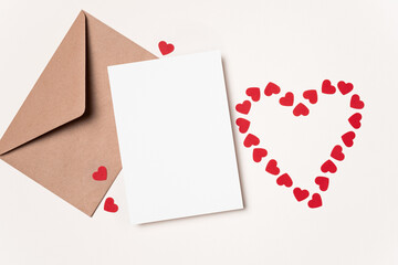 Valentines day card mockup and red hearts on white paper background