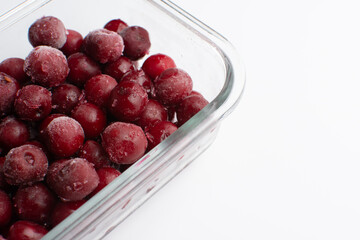 appetizing cherries frozen in a glass plate