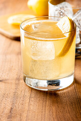 Whiskey sour. Classic Cocktail. Mixed drink with whiskey, lemon juice, sugar, and optionally, a dash of egg white. It is a type of sour, a mixed drink with base spirit, citrus juice, and a sweetener. 