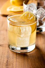 Whiskey sour. Classic Cocktail. Mixed drink with whiskey, lemon juice, sugar, and optionally, a dash of egg white. It is a type of sour, a mixed drink with base spirit, citrus juice, and a sweetener. 