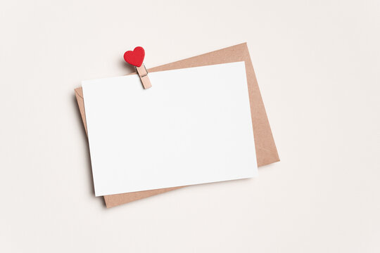 Valentines Day Blank Greeting Card Mockup With Envelope And Heart Peg On White