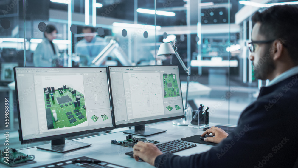 Poster Portrait of a Handsome Hispanic Industrial Engineer Developing 3D Model of a Circuit Motherboard on Computer CAD Software in a Factory. Modern Technological Research and Development Center.