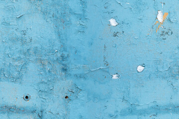 Texture of a painted vintage turquoise concrete wall.