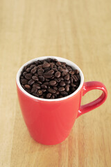 coffee beans in a cup on table