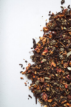 Dry tea leaves on surface