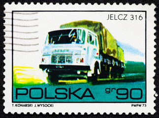 POLAND - CIRCA 1970: Postage stamp 90 grosz printed in the Poland shows Truck Jelcz 316 in road with the same inscription. Post stamp series devoted to Polish motor vehicles and automotives. - obrazy, fototapety, plakaty