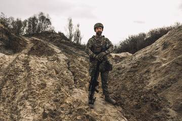 A soldier standing in a dig-position