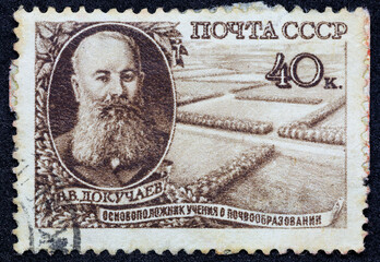 USSR - CIRCA 1949: Postage stamp 40 kopeck printed in the Soviet Union shows Portrait of geologist and geographer Vasily Dokuchaev. Post stamp series devoted to founder of the theory of soil formation - obrazy, fototapety, plakaty