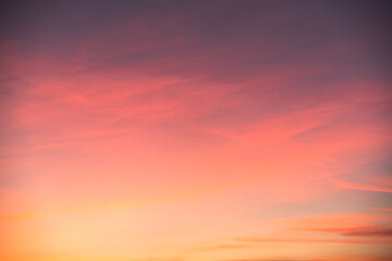 Blurry gradient pink orange blue purple. Blurred gradient pink orange blue purple. From light to dark. Sunset sky in variegated colors. Romantic background without details