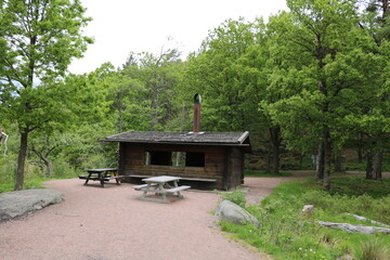Fototapeta na wymiar Picknick hut at lake Lilla Delsjön in Delsjöområdets naturreservat, Gothenburg Sweden