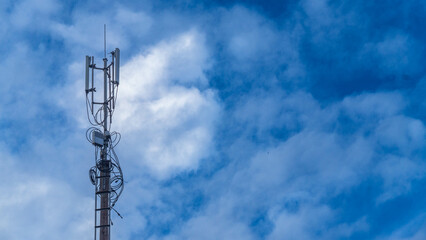 cell phone tower with beautiful blue sky with cloud