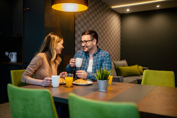 Couple enjoying their breakfast together
