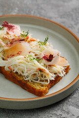 Toast with crab meat and fresh vegetables