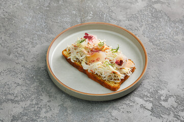 Toast with crab meat and fresh vegetables