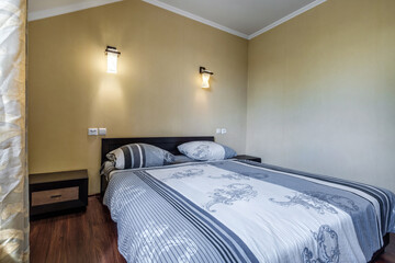 interior of cheapest bedroom in studio apartments or hostel.