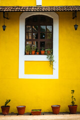 Vintage walls and windows windows of Goan houses in Fontainhas Panaji, Goa. Places to visit in Goa when on vacation.