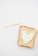 sandwich for breakfast in form of heart with cheese - good morning inscription