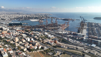 Fototapeta na wymiar Aerial drone photo of industrial container logistics unloading import and export container terminal of Perama - Piraeus, Attica, Greece