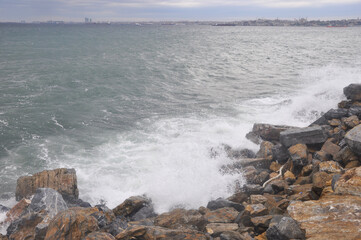 waves crashing on rocks
