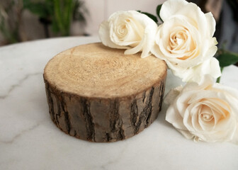 Elegant White Flowers wooden display on marble 