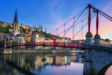 Fototapeta na wymiar Famous red footbridge in the morning, Lyon