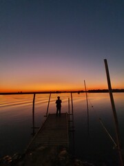 Fototapeta premium fishing at sunset
