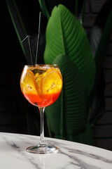 Glass of iced alcohol cocktail in bar