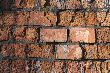 texture of old cracked and destroyed red brick wall