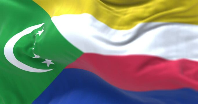 Close-up view of the Comoros national flag waving in the wind