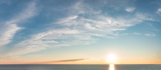 Fototapeta premium Dramatic Colorful Sunset Sky over Mediterranean Sea. Cloudscape Nature Background.