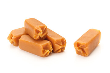 Chewy caramel or toffee candy on white